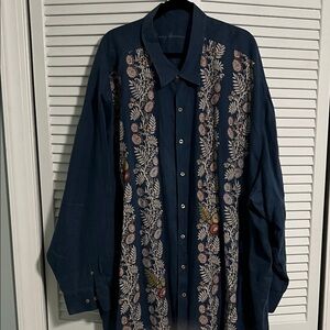 Tommy Bahama Dark Blue Linen Shirt with Wild Flowers Printed on the front.
